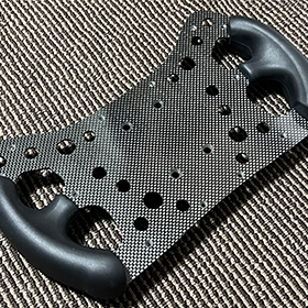 【製作事例】自動車の競技用ステアリング関連パーツをカーボンで製作
