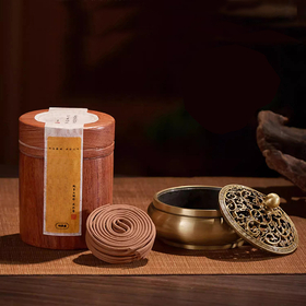 Temple and meditation dedicated hand-rolled incense, authentic oud fragrance, spiral-shaped agarwood.
