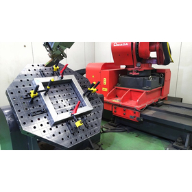 High-precision welding using a welding fixture and skilled techniques.