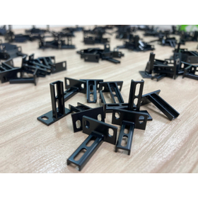 Mass production processing of small aluminum items.