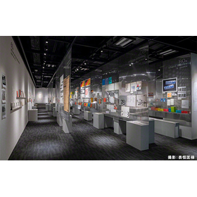 Exhibition art display wall - custom-made stainless steel perforated metal.