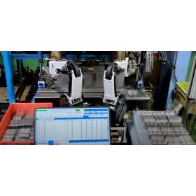 A robot for automatic supply and discharge of stainless steel processed products to the press machine.