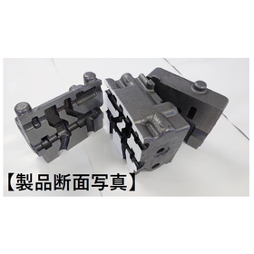 Thin-walled, lightweight ductile cast iron hydraulic components for construction machinery.