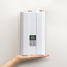 Palm-sized Mirable automatic faucet integrated energy-saving electric instant water heater.