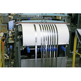 Slitting, leveling, and cutting of metal foil.