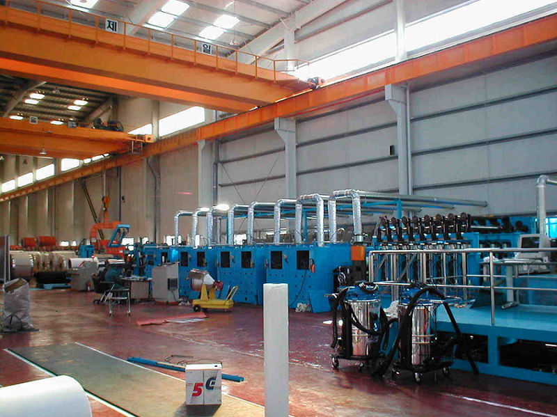 平面研磨システム　コイルライン研磨機