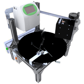 缶詰への自動印字 ターンテーブルタイプのインクジェットプリンター