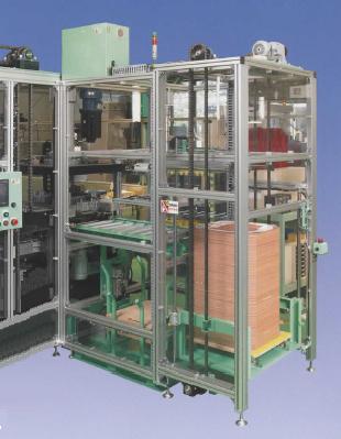 排出装置　ゲージ盤自動段積み排出装置