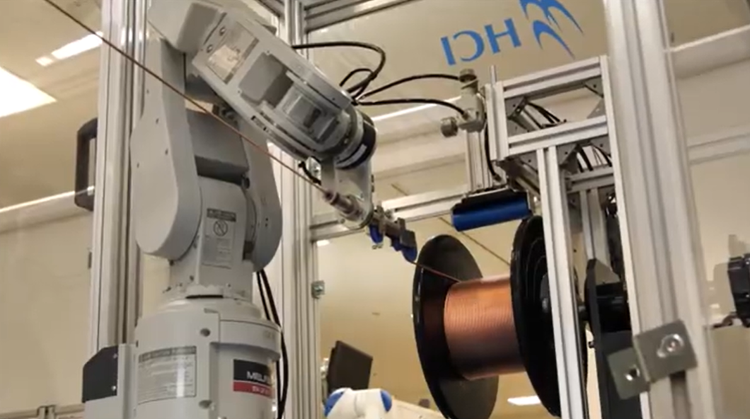 【自動車業界向け】ケーブル自動整列巻取ロボットシステム