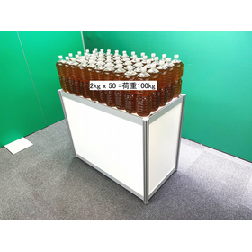 Display stand with storage shelves for automotive parts exhibition