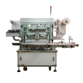 【菓子向け】コンパクト高速トレーシーラー『TR-56シリーズ』 製品画像