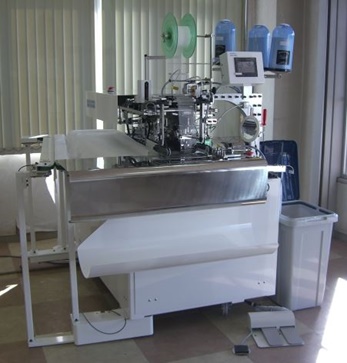 カーテン芯付け・天伏せ縫い自動機『NCH-350C』