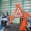 Remote-controlled robotic arm for heavy objects, capable of handling up to 2 tons, contributing to labor-saving.