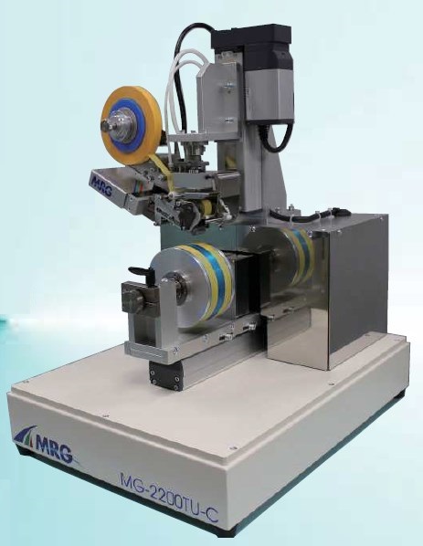 『円筒テープ貼り装置』