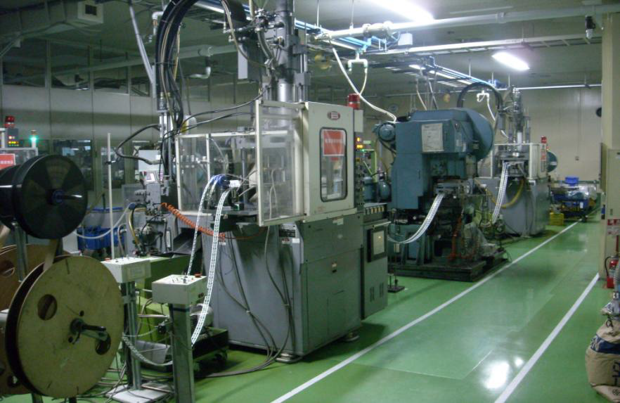 加工技術『フープ連続インサート成形』