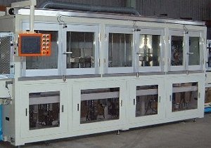 直線搬送型 軸受超仕上げバリ取り装置