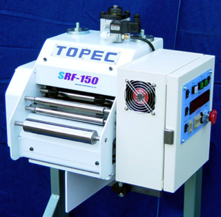 プレス材料送り装置