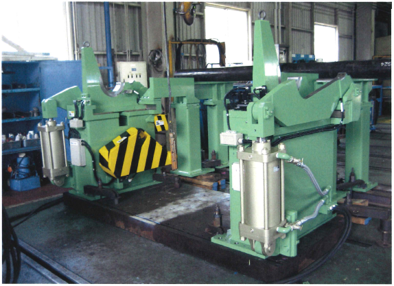 アンワインダー・オシレート装置