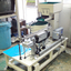 Parts feeder for spray nozzle head with directional cutting mechanism.